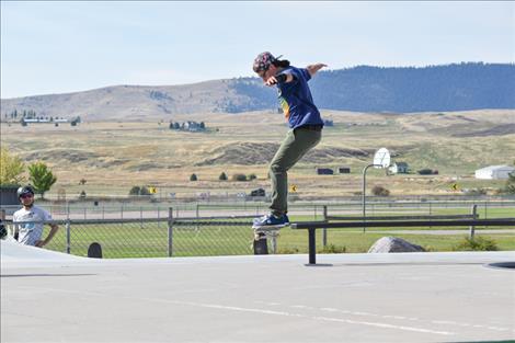 Skaters flip their boards, roll across rails and dip into the bowl during last weekend’s annual Skate Jam in Polson.