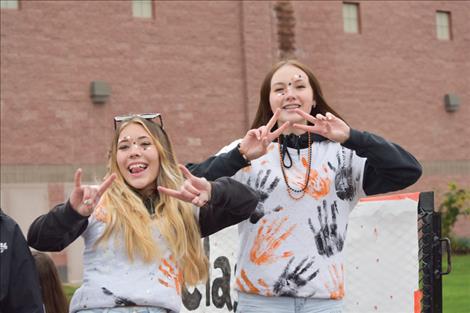 Students show school pride during the parade.