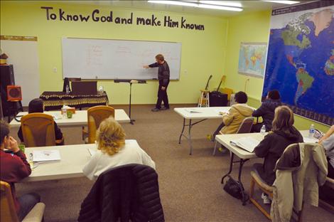 Missionaries that will depart on Dec. 11 for Gabu, Guinea Bissau listen to a lesson by Pastor Lynn Lapka in their Discipleship Training Classes.