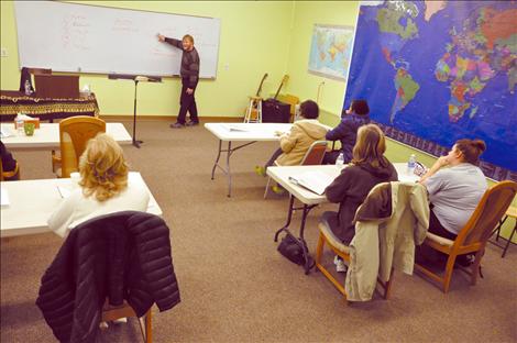 Missionaries that will depart on Dec. 11 for Gabu, Guinea Bissau listen to a lesson by Pastor Lynn Lapka in their Discipleship Training Classes.