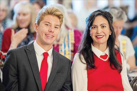 Montana Secretary of State Christi Jacobsen smiles for a photo with 2022 Constitution Contest winner Michael Faccenda.