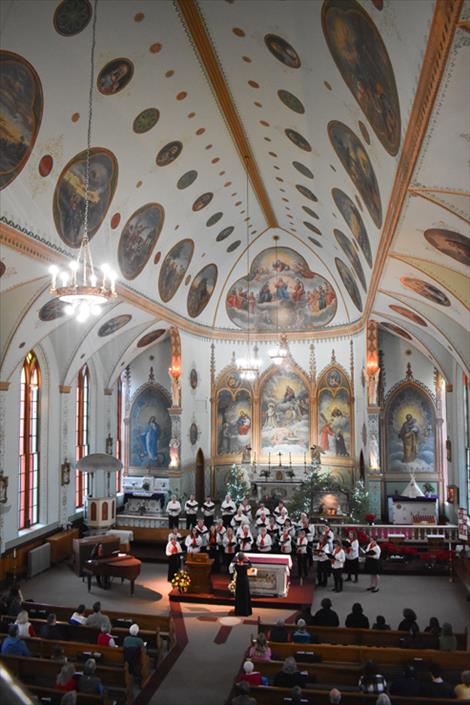 Mission Valley Choral Society members perform their holiday spectacular concert at the Mission Church in St. Ignatius.