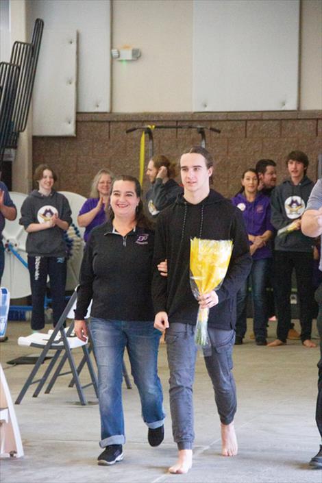 Polson Pirate senior swimmer Kyle Alexander along with swim team mates were recognized for their achievements and contributions to their team during senior night prior to the start of the Jan. 5 meet.