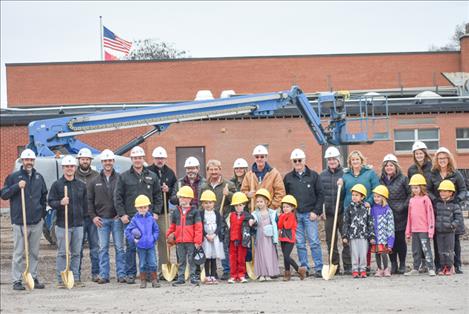 Cherry Valley students, teachers and construction workers Swank Enterprises with pose with golden shovels during a Dec. 14 groundbreaking event for a construction project at their school.  Below: Cherry Valley students pose for a photo with Swank project superintendent Monte Moultray.