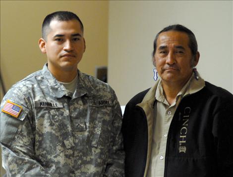 Stan Kenmille, Army National Guard, stands with his father, Mike Kenmille.