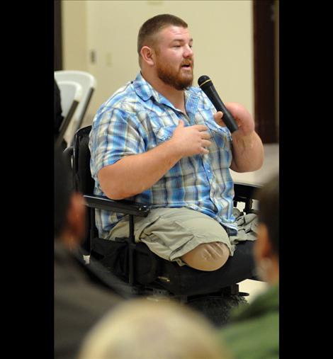 Lance Cpl. Tomy Parker speaks at the Round Dance to honor veterans.