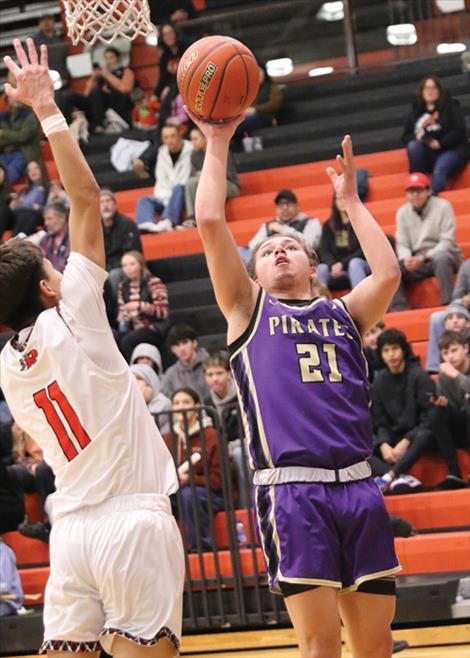 Polson’s Ezra Fasthorse shoots a jumper in a game against Ronan.