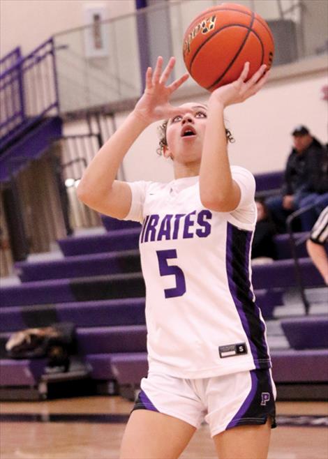 Rylee Taylor-Jefferson goes in for a layup after  a steal during an earlier season game against the Lady Libby Loggers.