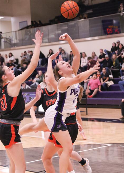 Lady Pirate Julia Barnard lays it up in a crowd.