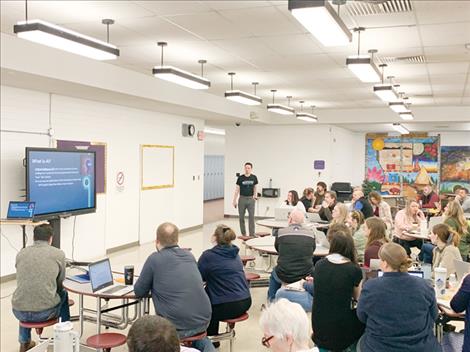 Polson educators learn about artificial intelligence from Polson High School science and computer science teacher Connor Mulvaney.