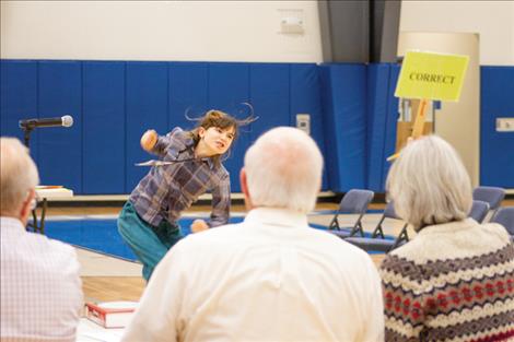 Summer Goddard / Valley Journal Apollonia Hall, a fifth grade student from Charlo, celebrates upon seeing the “correct” sign held up after spelling the final, winning word correctly at the Lake County Spelling Bee.