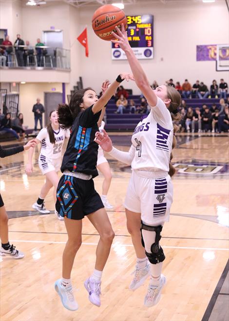 Charlo’s Sheadon Kain makes a layup during a semifinal game against Two Eagle River.