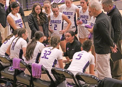 Polson girls basketball head coach Brandie Buckless fires up her team during a Feb. 15 game against the Libby Lady Loggers.