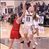 Lady Eagle Jodessa McGreevey goes for a layup in a game against Noxon at the 14C District tournament.