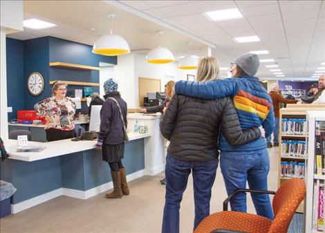 Community members gather to celebrate the library’s reopening on Feb. 14. 