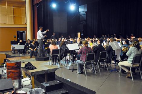 Guest conductor Dusty Molyneaux directs students from across Mission Valley at the fourth annual band festival. 