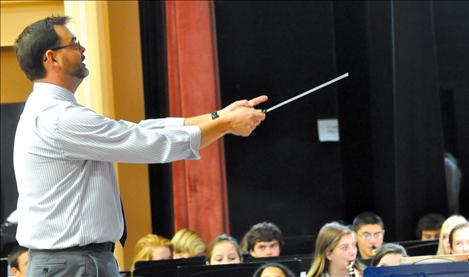 Guest conductor Dusty Molyneaux directs students from across Mission Valley at the fourth annual band festival. 