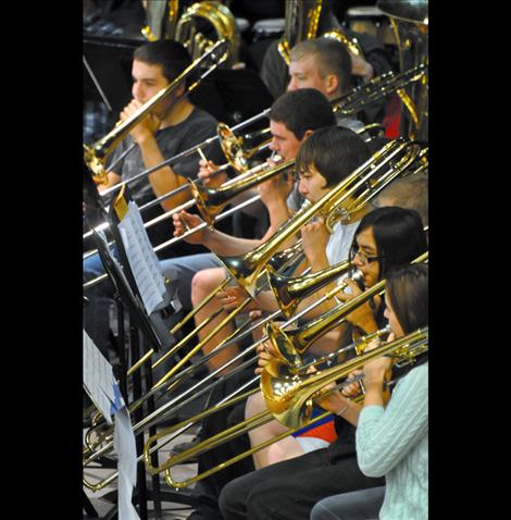 For trombone players, performing with 145 other instrumentalists on a medium-sized stage means taking extra care to not bump bells. 