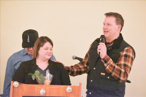 Chriss Stutzman, right, and his wife Laurie accept the Polson Chamber of Commerce Business of the Year award at the chamber’s annual banquet.