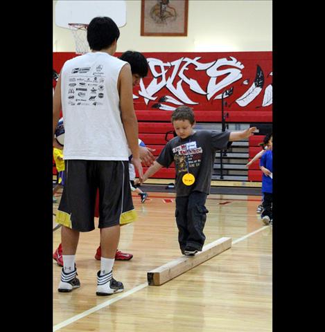 Itty Bitty Basketball players learn fundamentals, teamwork at early age.