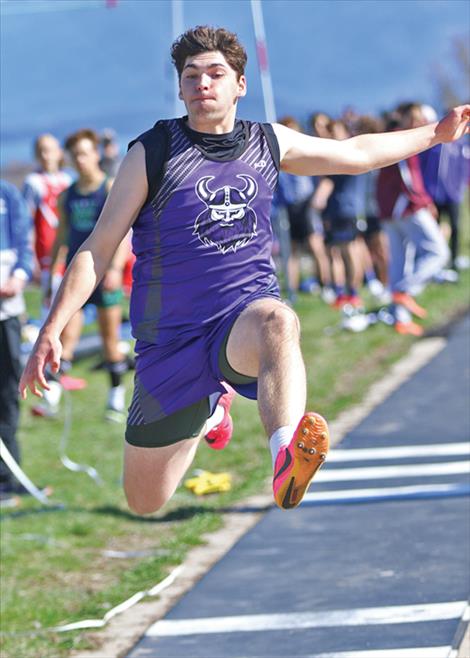 Tasker Brown of Charlo, center, competes in the Triple Jump.