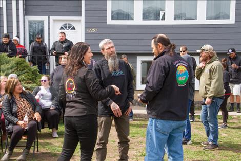 Salish Kootenai Housing Authority Executive Director Jody Perez speaks with NARSS Executive Director Don Roberts and NARSS Pablo Hub Director Tony Meyers.