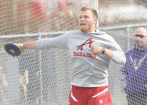 Arlee Warrior Jake Knoll takes second place in the varsity Discus event.