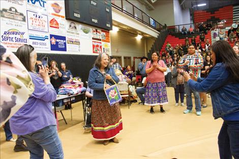 Kathi Beeks /Valley Journal Jeanne Christopher shows the beaded bag presented to her as a gift of appreciation for her 50 years of service to the children of the reservation.
