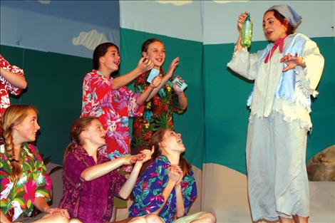 The beach bums wish for magic water during the Missoula Children’s Theatre performance of “Blackbeard the 