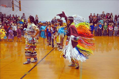 Randi Auld and Blue Sky FireStrike dance and share native heritage with students at K. William Harvey Elementary School. 