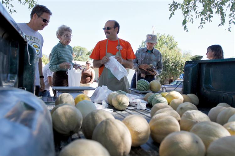 Buyers check out the goods at Melon Days.
