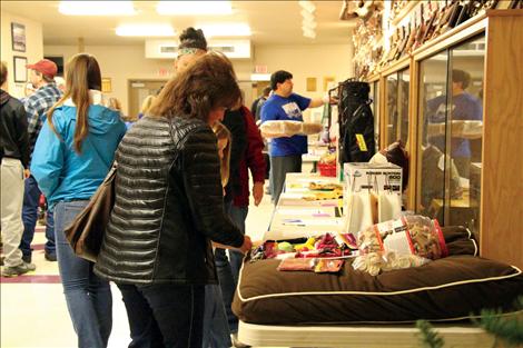 A silent auction helped raise funds for Les Rice during the basketball game.