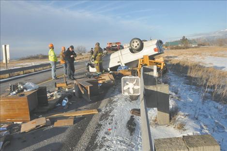 Debris  littered the highway after an Idaho driver flipped his truck over a guardrail when he fell asleep at the wheel.