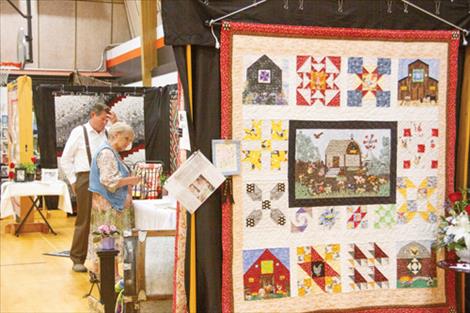 Community members view quilts on display at the Ronan High School during the  Mission Mountain Quilt Guild’s 31st annual quilt show held June 8-9.