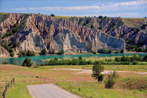 The Flathead River runs full above. Though spring rains pushed the potential for fire starts later into the month of July, a normal fire season with “likely more fire activity than 2023,” is still expected across Montana.