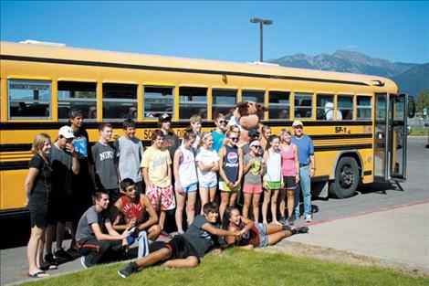 Ronan’s cross-country team poses for a photo moments before starting their 100-mile journey