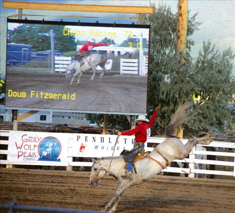 A jumbotron documents every move in the bronc riding contest at the Flathead River Rodeo last weekend in Polson.