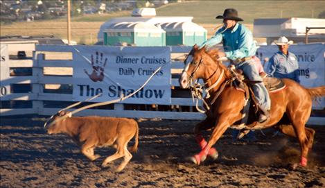 Local roper Zanen Pitts competes in calf roping Saturday night. 