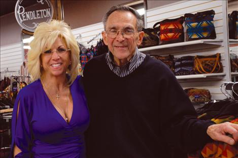 Jim Duford, right, stands with an arm around daughter Tali Barron. The pair has operated the First Resort since 1992. 