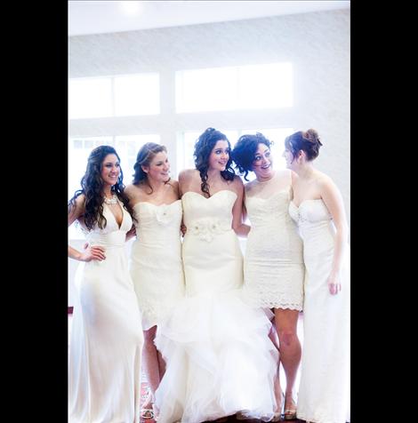 Kacie Busby, Jessica Bagnell, Kaelyn Binder, Shelbi Mallon-Reid and Taylor Rost model wedding dresses from Avant Bridal during the 2014 Mission Valley Bridal Fair held Jan. 12 at KwaTaqNuk Resort in Polson. See more event photos at  www.valleyjournal.net