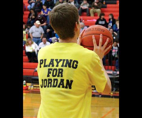 Yellow t-shirts showed support of Head Coach Shelly Buhr's neice, who is fighting cancer.