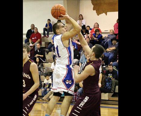 Stuart Grant of Mission scored 21 points in the Bulldogs’ 64-46 win over Troy.