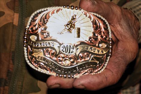 Of the 400 he has earned, Schall is most proud of the 2012 Senior Barrel Race buckle. “Look at the center,” he said with a smile.