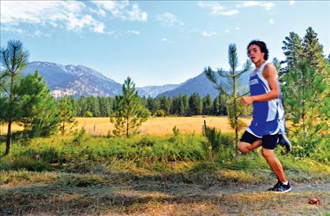 Paden Alexander bolts through the Ronan Canal Run. He won the race in 15:58.