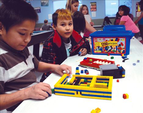 Thomas Redmond, left and Leighton Wise Spirit enjoy some after-school Lego time at the Boys and Girls Club in Ronan.