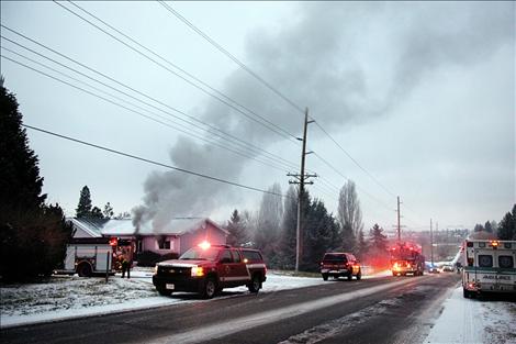 Smoke pours from a duplex on Hillcrest Drive in Polson on the morning of Jan. 23.