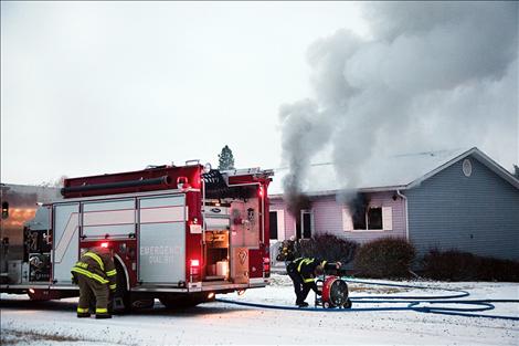 Smoke pours from a duplex on Hillcrest Drive in Polson on the morning of Jan. 23.