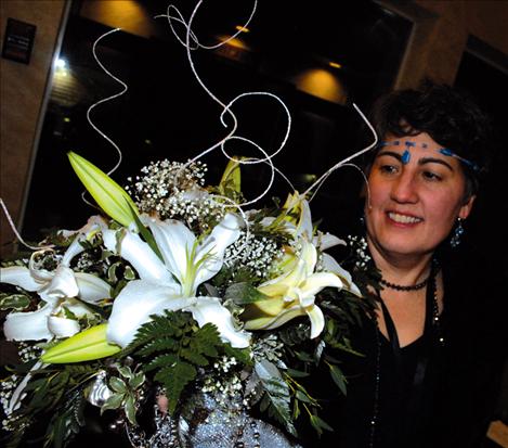 Theater owner Becky DuPuis dressed in roaring '20s attire for the gala opening.