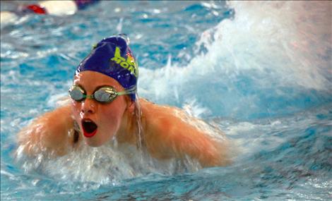 16-year-old Mollie Lemm competes for the Lake Monsters at Mission Valley Aquatic Center Saturday, Jan. 25.
