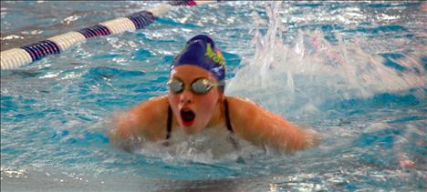 16-year-old Mollie Lemm competes for the Lake Monsters at Mission Valley Aquatic Center Saturday, Jan. 25.